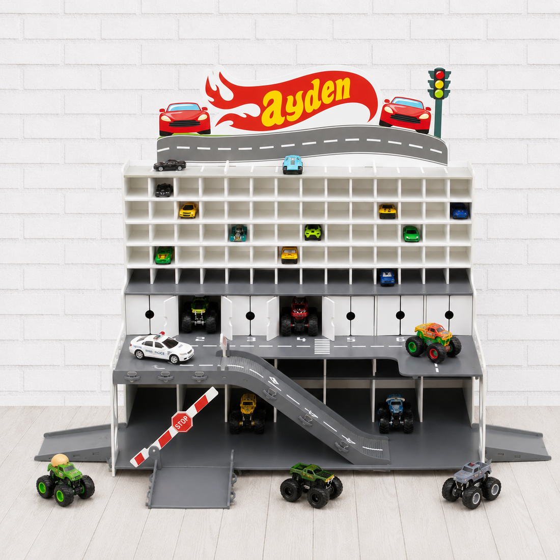 White Arkiv 91-slot personalized wooden toy car garage — the anchor piece for a playroom corner