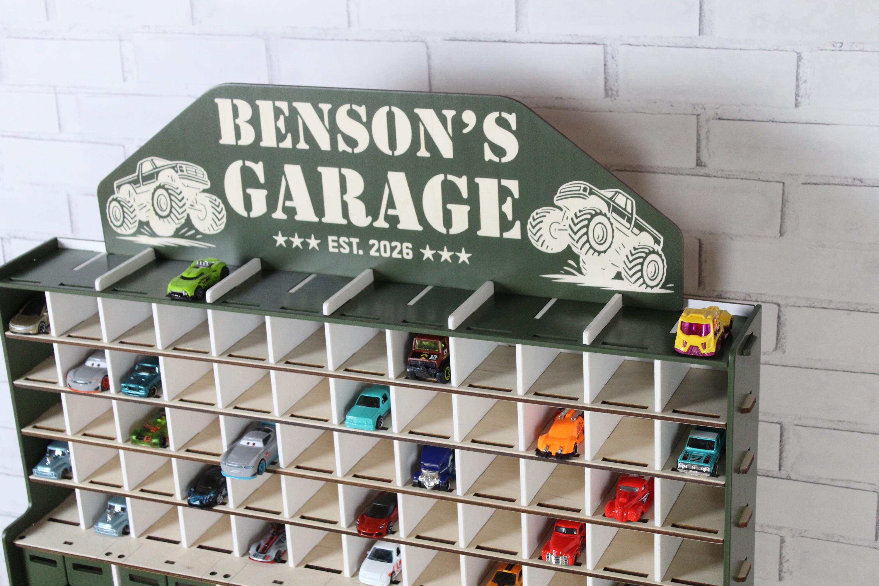 Wooden toy car storage garage with Benson’s Garage nameplate and 1:64 diecast cars, upper side