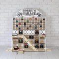 Small wooden toy car garage for 1:64 cars with ramps, LED lights and Bobby’s Garage nameplate