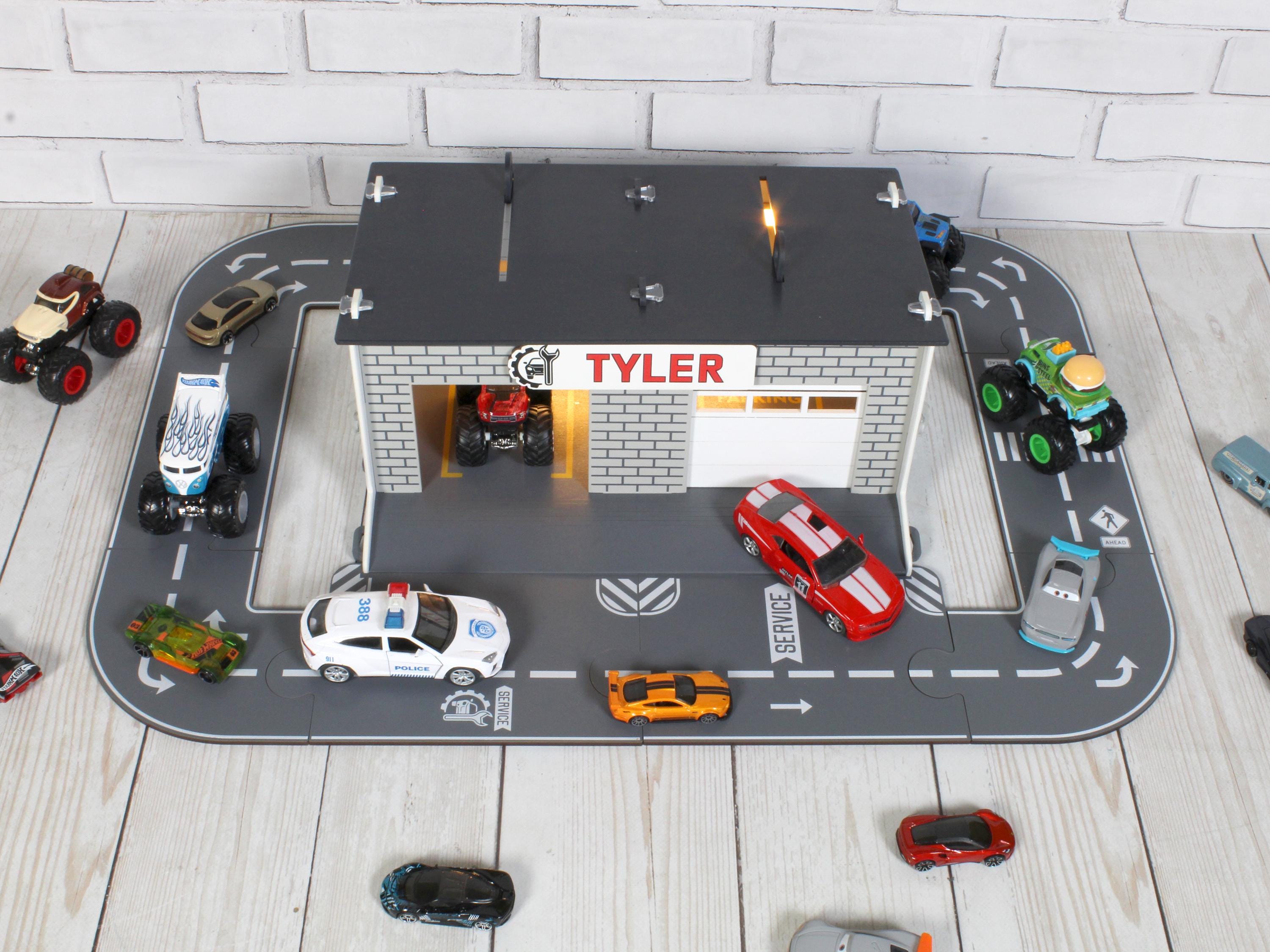 Top view of wooden toy car garage with circular road layout and parking area